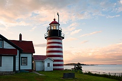 Old Striped Lighthouse Tower Sines Brightly in Maine